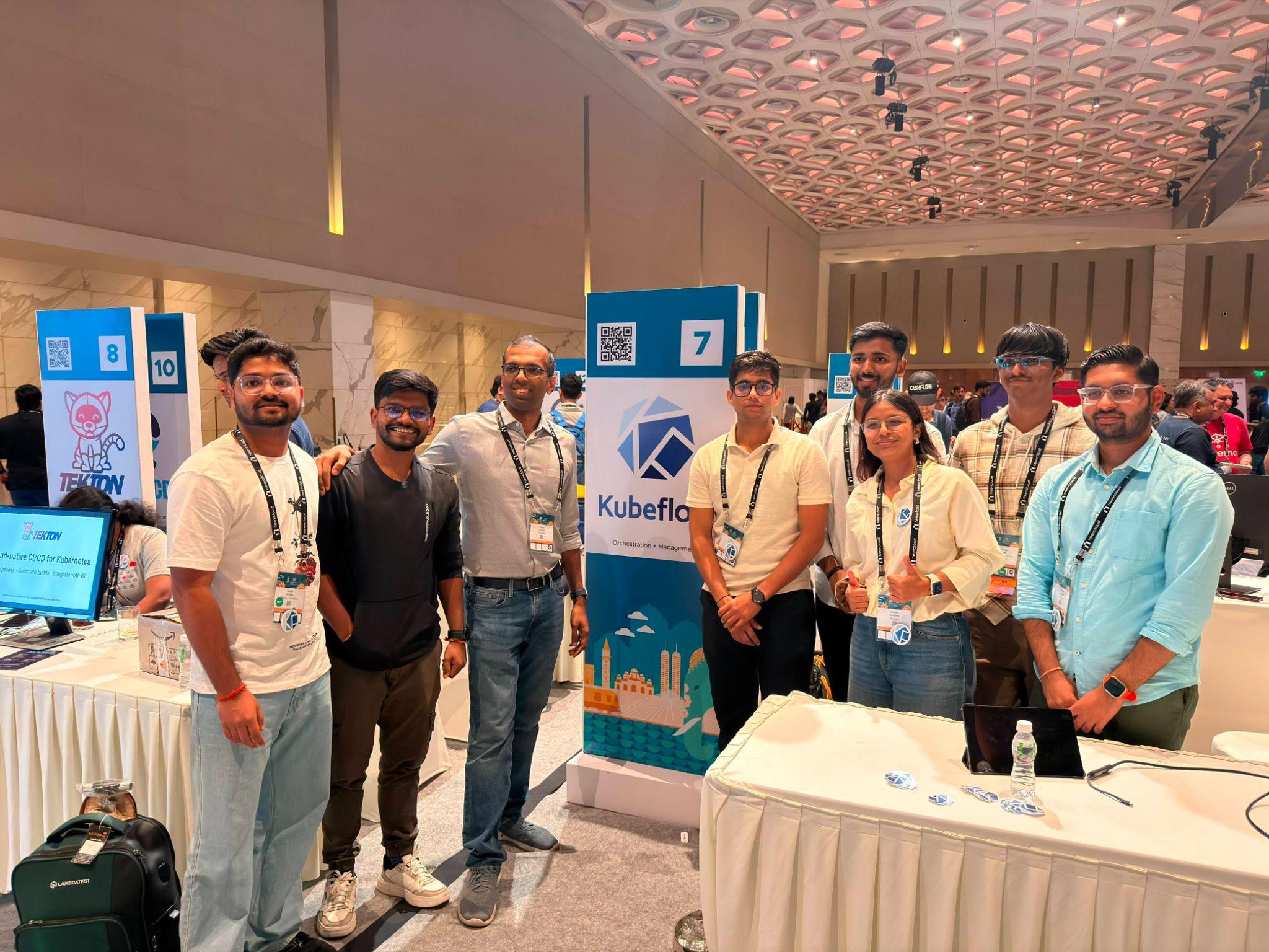 Kubeflow volunteer team at the booth